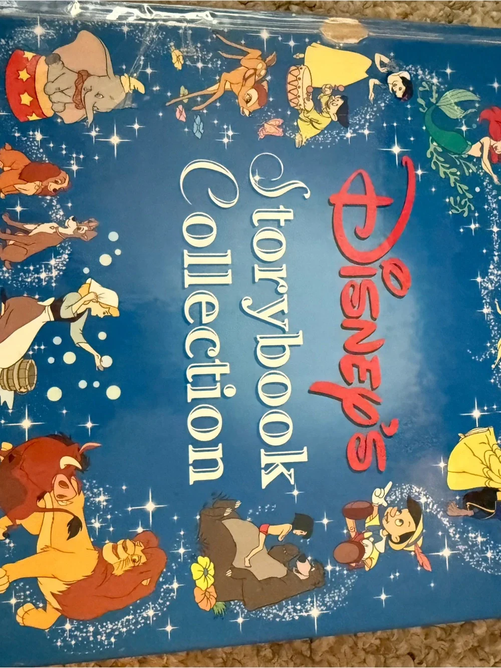 Disney Blue Storybook Collection Cover with Multicolor Character Illustrations